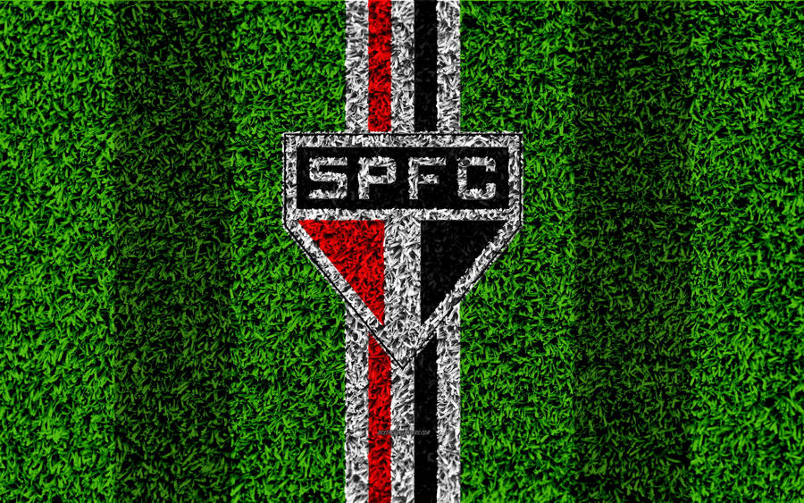 Sao Paulo Fc Logo On Grass Wallpaper