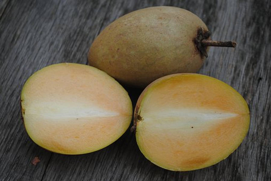 Sapodilla Fruits Wooden Table Wallpaper