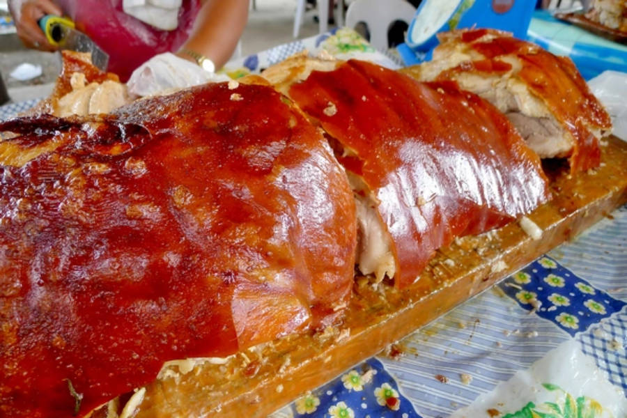 Savor The Crispiness: Experience The Majestic Lechon Wallpaper