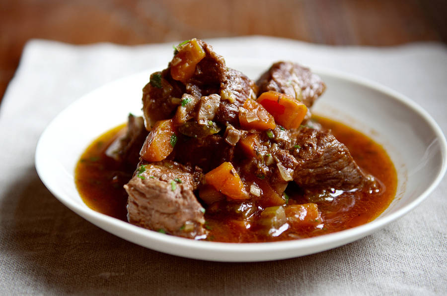 Savory Beef Bourguignon In A Dutch Oven Wallpaper