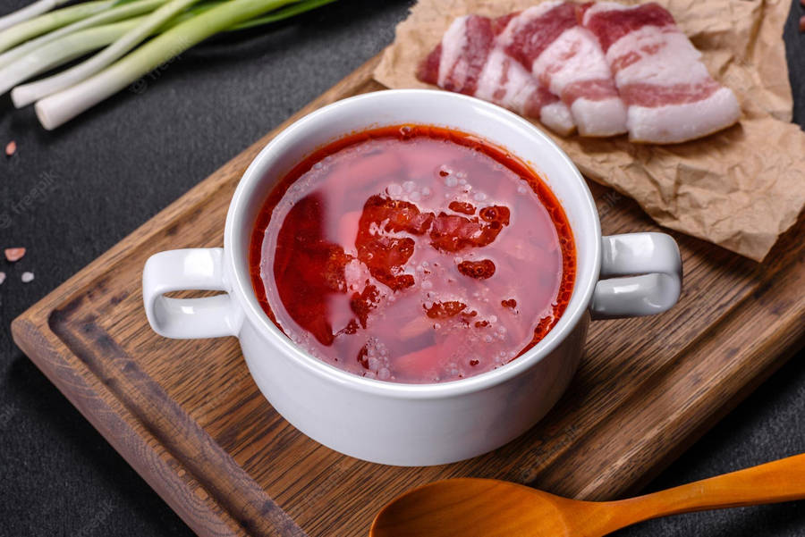 Savory Pork Borscht Dish On Table Wallpaper