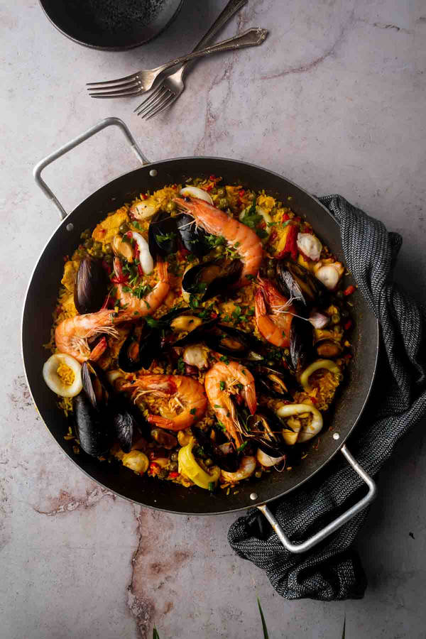 Savory Spanish Paella With Prawns And Mussels Wallpaper