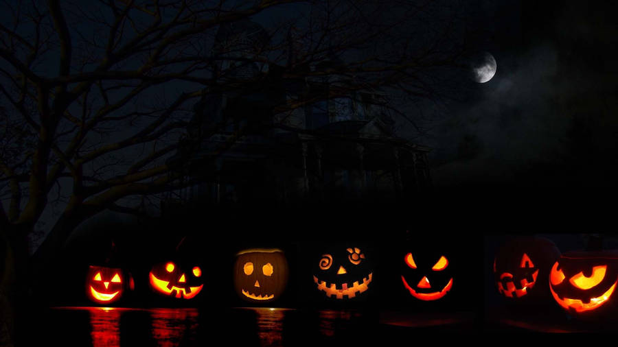 Scary Halloween Carved Pumpkin Lanterns Wallpaper