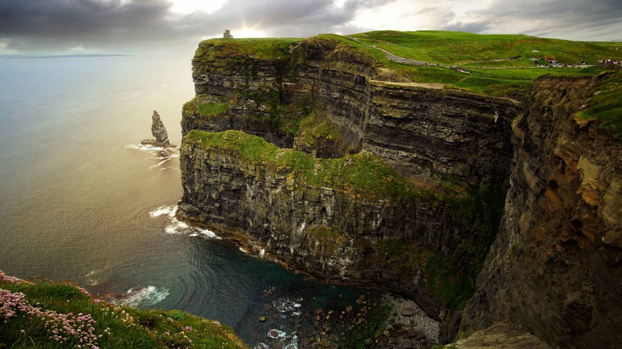 Scenic Cliff By Sea Wallpaper