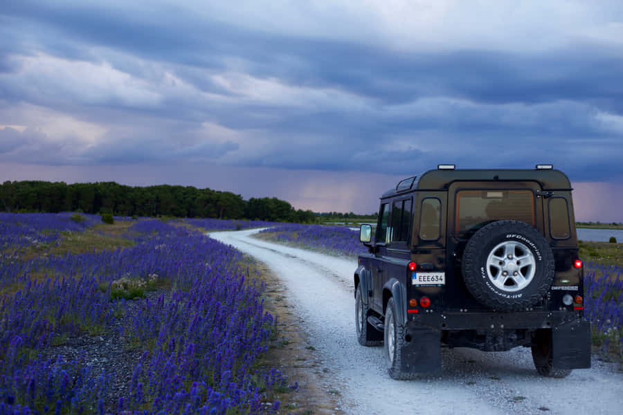 Scenic Road Trip Through The Mountains Wallpaper