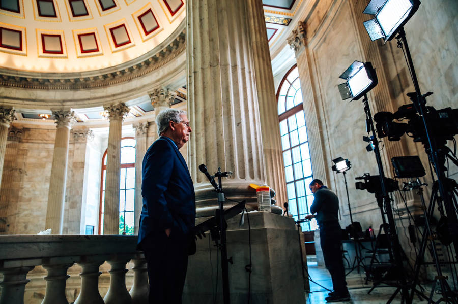 Senator Mitch Mcconnell Engrossed In An Interview Wallpaper