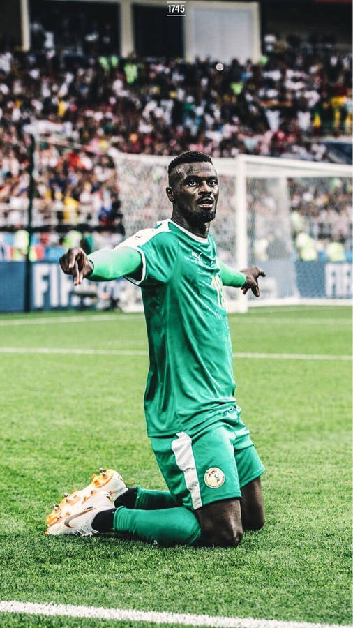 Senegal Football Player In Field Wallpaper