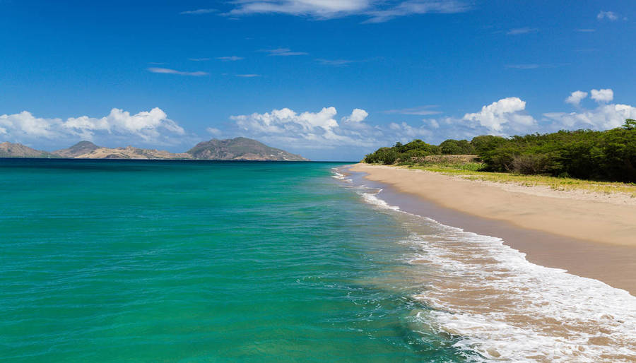 Serene Beach In St Kitts And Nevis Wallpaper