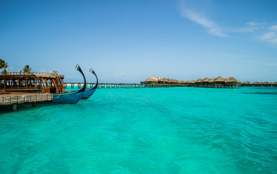 Serene Maldivian Escape With Dhoni Boat Wallpaper