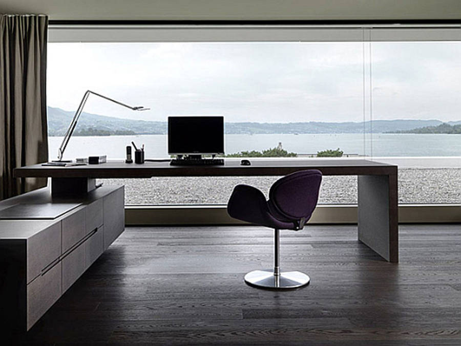 Serene Office Set-up Overlooking The Coastline Wallpaper