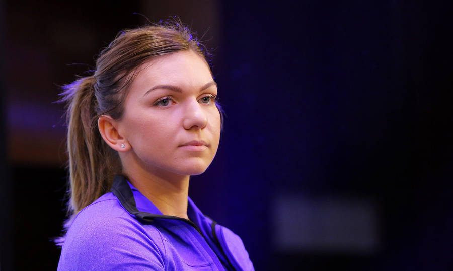 Serious Simona Halep In Purple Wallpaper