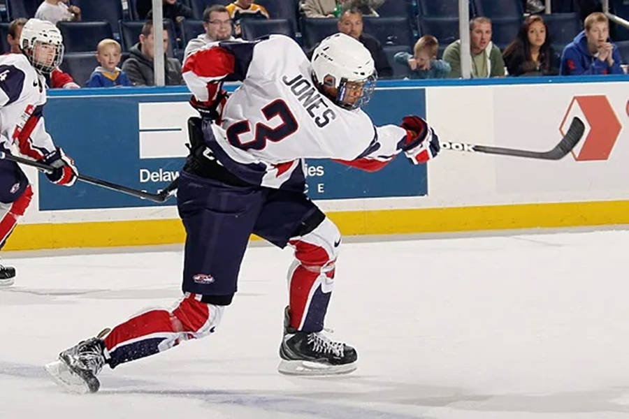 Seth Jones Of Columbus Blue Jackets In Action Wallpaper