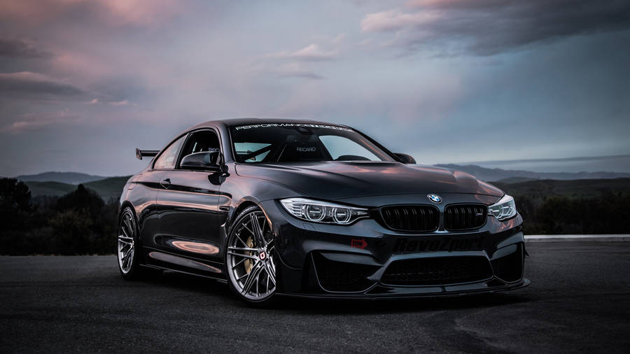 Shiny Black Bmw M4 Car Wallpaper