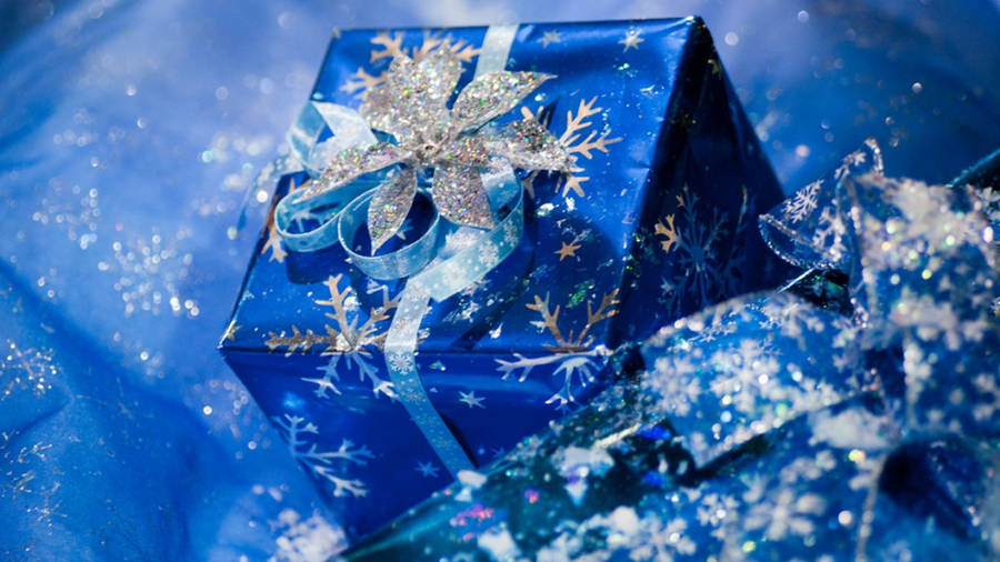 Shiny Blue Christmas Present Wallpaper