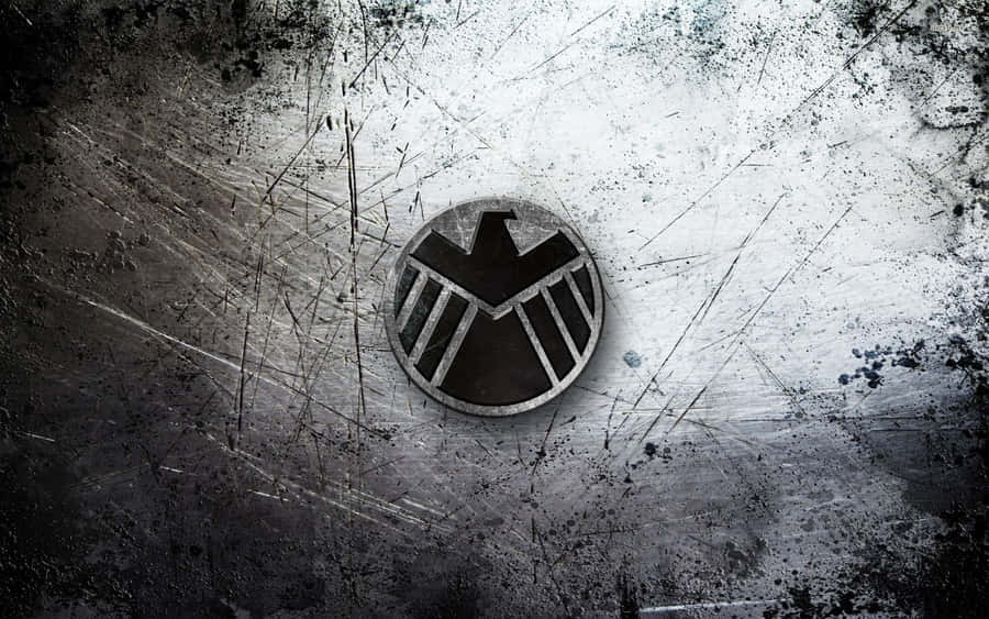 Shiny Shield On A Dark Background Wallpaper