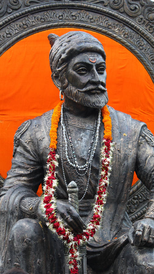 Shivaji Maharaj With Red And Orange Neck Garland Wallpaper