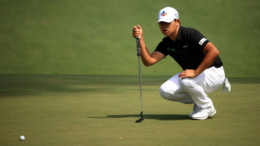 Si Woo Kim Checking The Grass Wallpaper