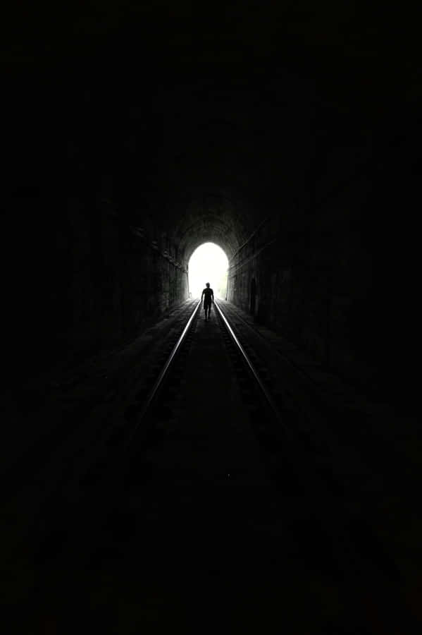 Silhouettein Tunnel Light End.jpg Wallpaper