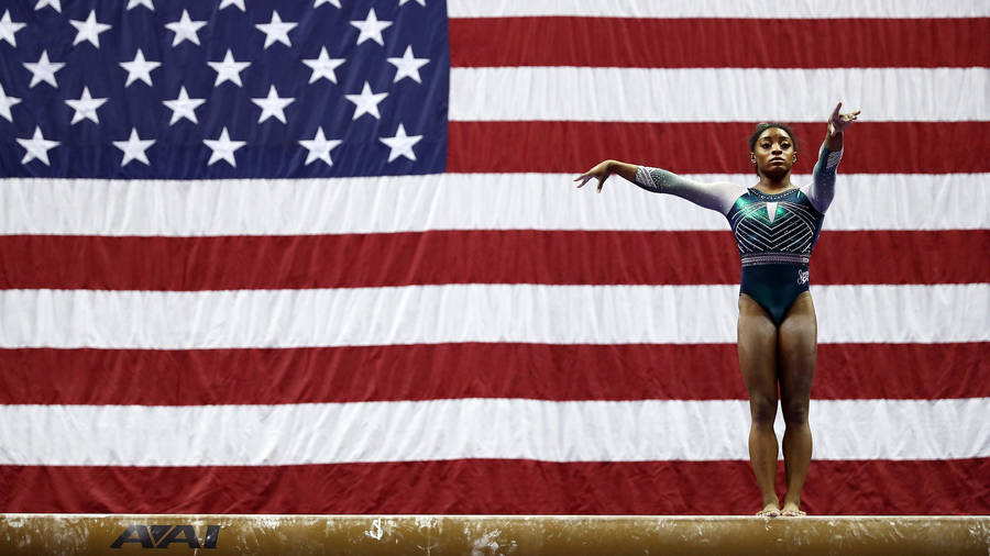 Simon Biles And Usa Flag Wallpaper