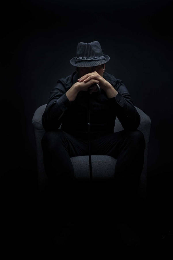 Sitting Mafia Boss With Fedora Wallpaper