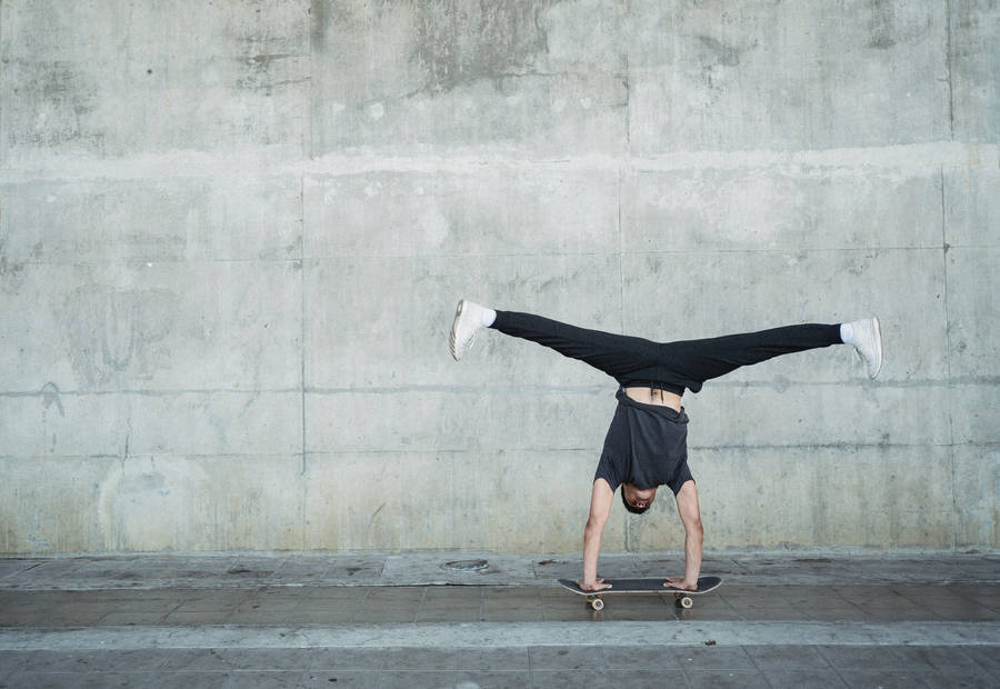 Skater Boy Handstand Trick Wallpaper