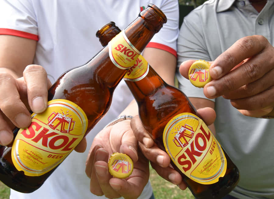 Skol Beer Bottlesand Caps Wallpaper