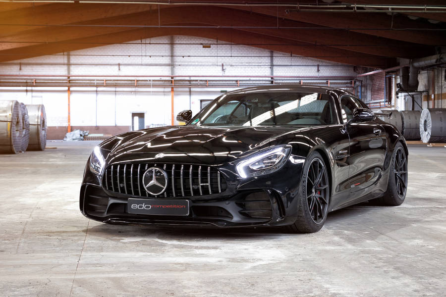 Sleek And Luxurious Black Amg Gtr Showcasing Absolute Power And Class Wallpaper