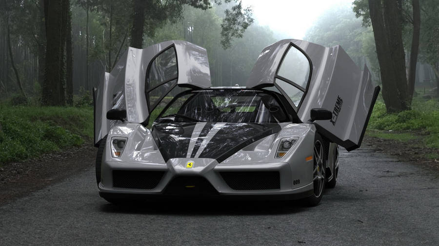 Sleek Silver Enzo Ferrari - A Display Of Elegance And Power Wallpaper