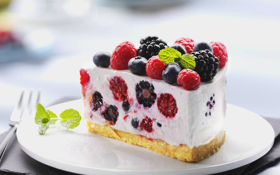 Slice Berry Cake On Plate Wallpaper