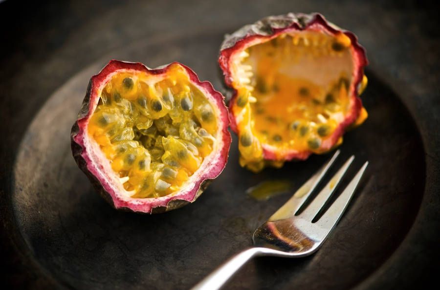 Sliced And Eaten Ripe Passion Fruit Wallpaper