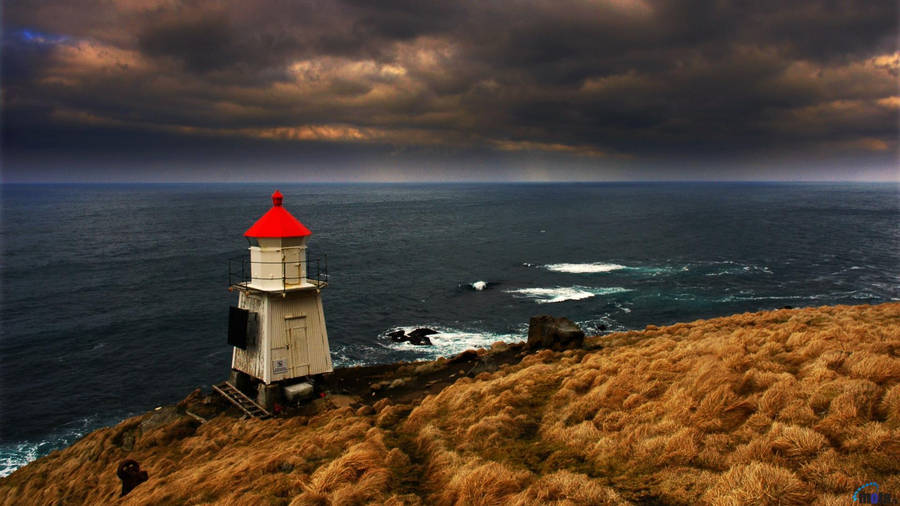 Small Red And White Lighthouse Wallpaper