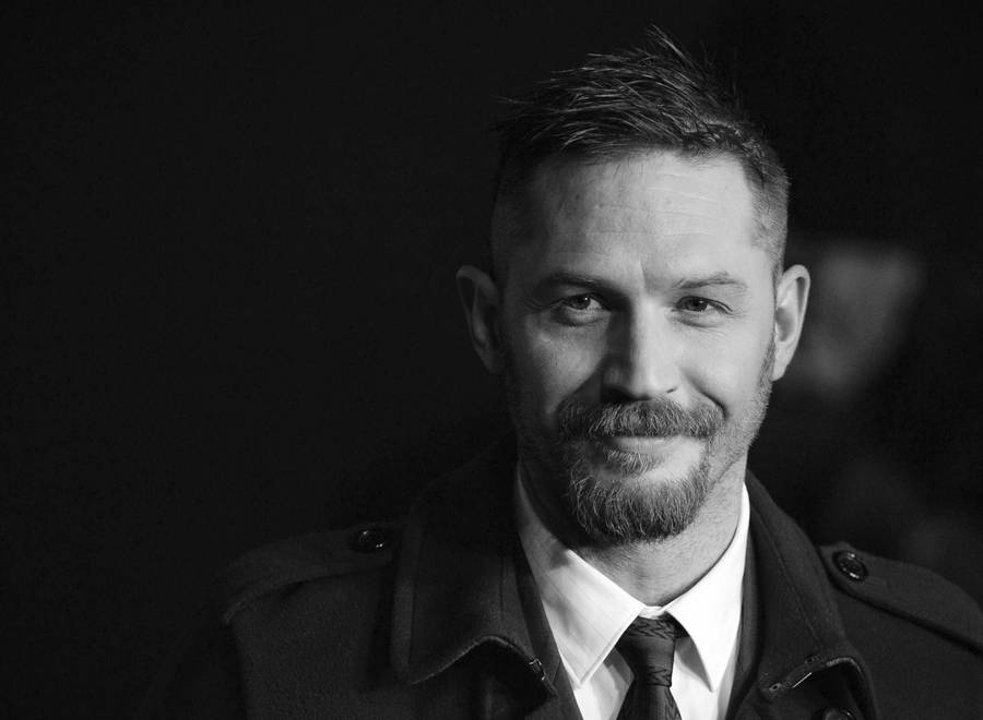 Smiling Actor Tom Hardy Wallpaper