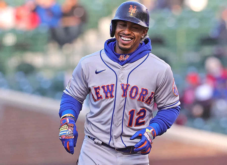 Smiling Baseball Playerin New York Mets Uniform Wallpaper