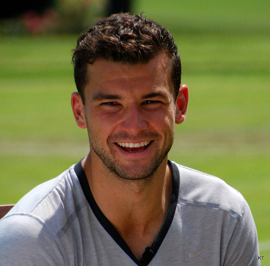 Smiling Grigor Dimitrov Portrait Wallpaper