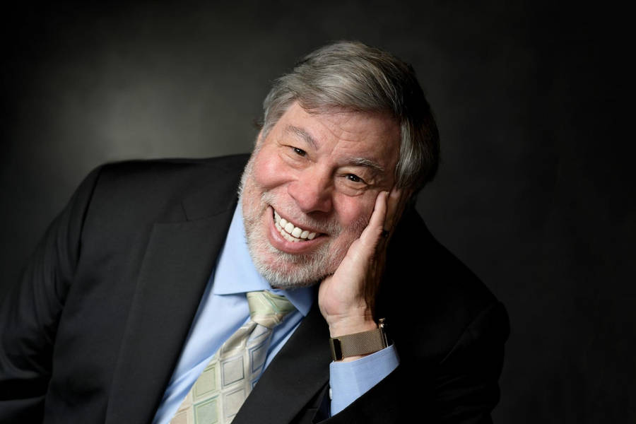 Smiling Steve Wozniak Hand On Face Wallpaper