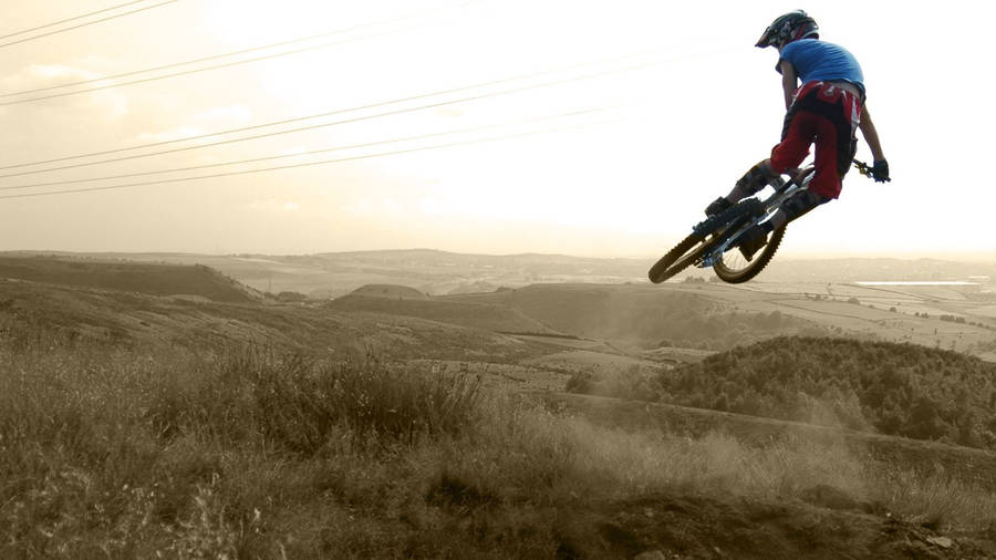 Smoky Grassfield Mtb Extreme Stunt Wallpaper