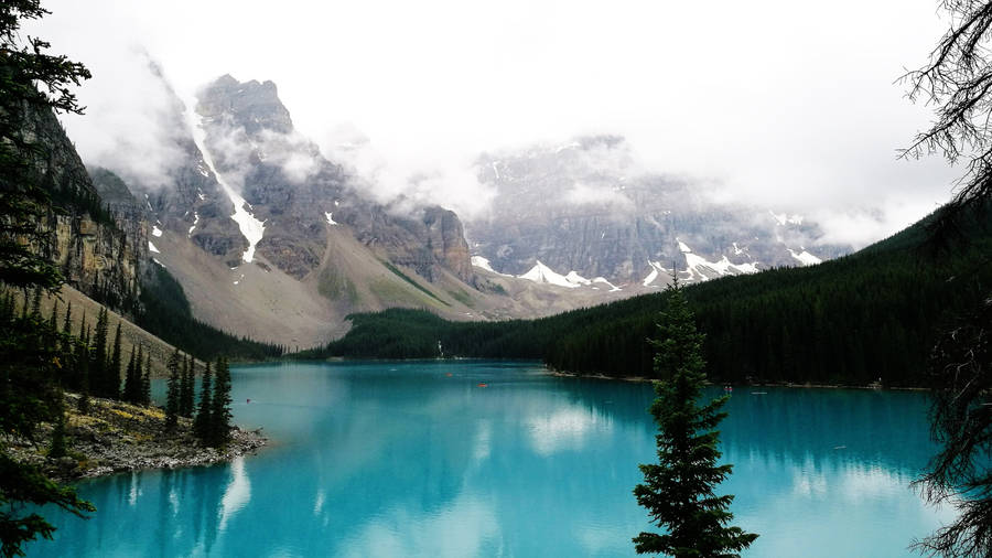 Snow Mountains And Aqua Blue Lake 4k Flat Wallpaper