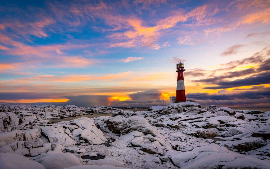 Snowy Lighthouse Wallpaper