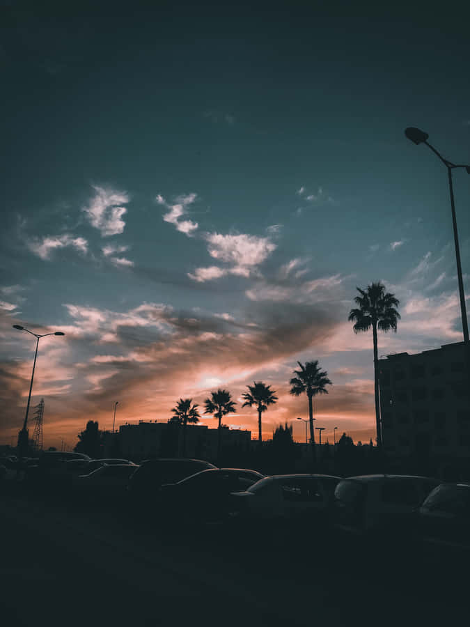 Soak Up The Beauty Of The City Sunset Wallpaper