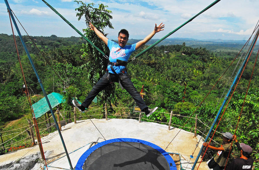 Soaring High On Bungee Trampoline Jump Wallpaper