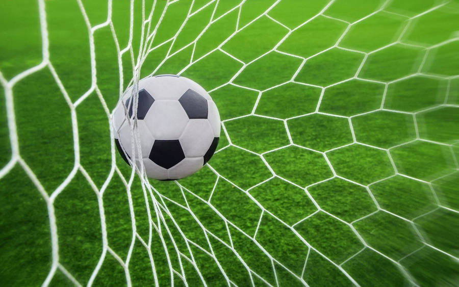 Soccer Ball Hits Goal Wallpaper