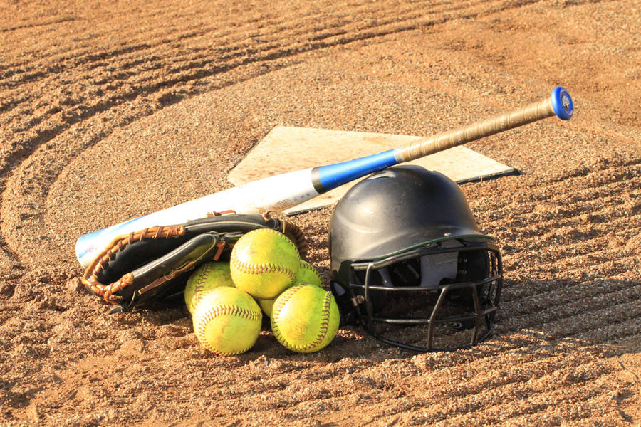 Softball Pile With Bat And Helmet Wallpaper