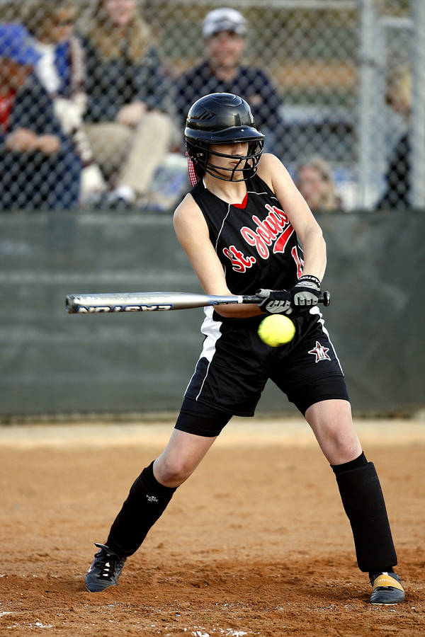 Softball Player All Black Uniform Wallpaper