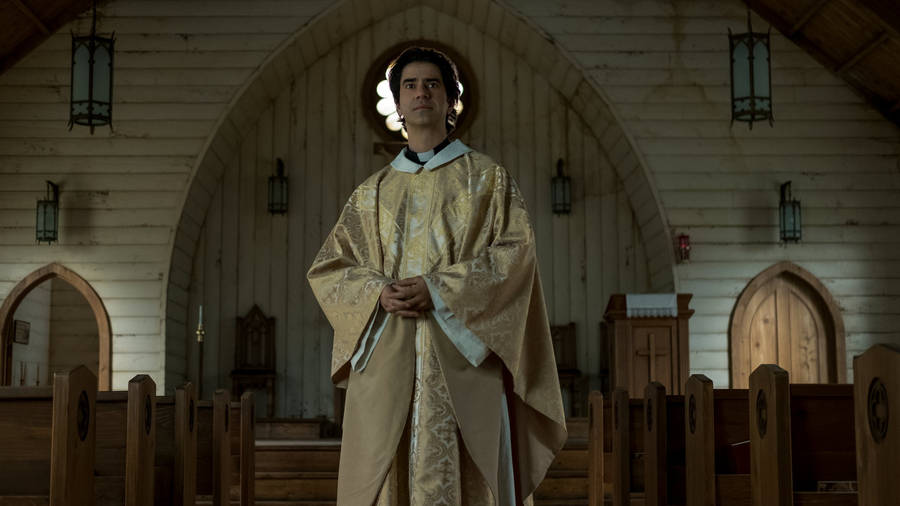 Solemn Midnight Mass With Father Paul In The Chapel Wallpaper