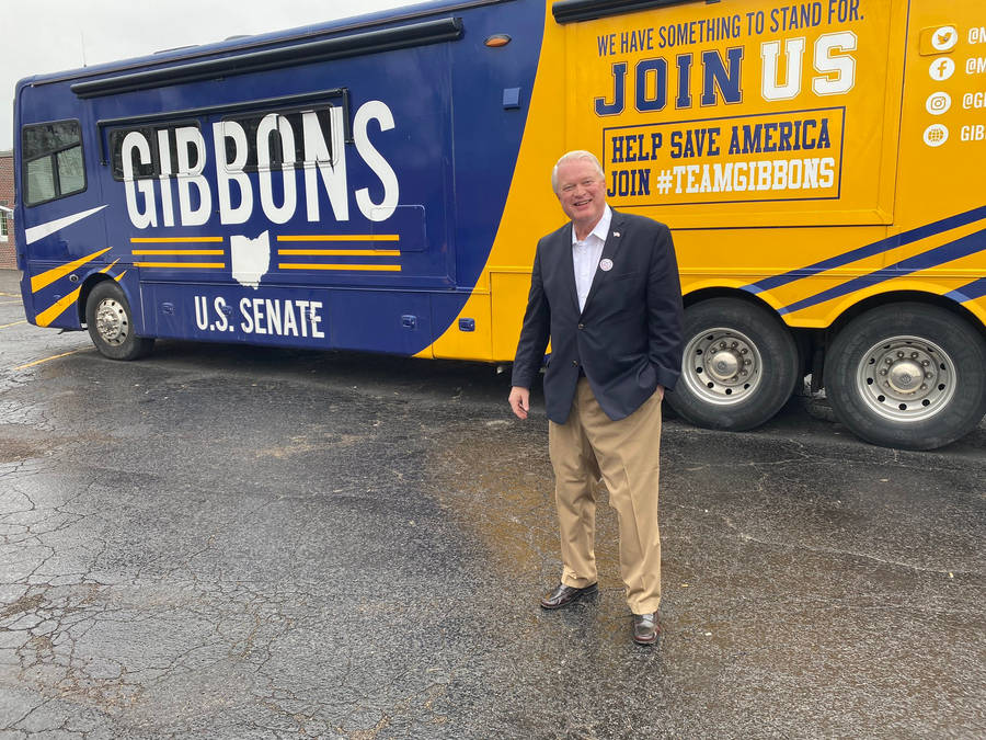 Solo Picture Of Mike Gibbons With Bus Wallpaper