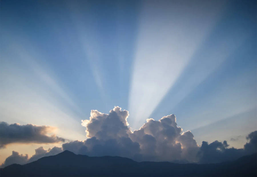 Somber Funeral Clouds Wallpaper