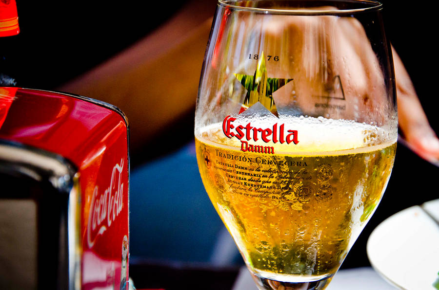 Sparkly Glass Of Estrella Damm Wallpaper