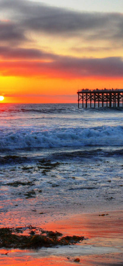 Spellbinding Sunset At Malibu Beach Wallpaper