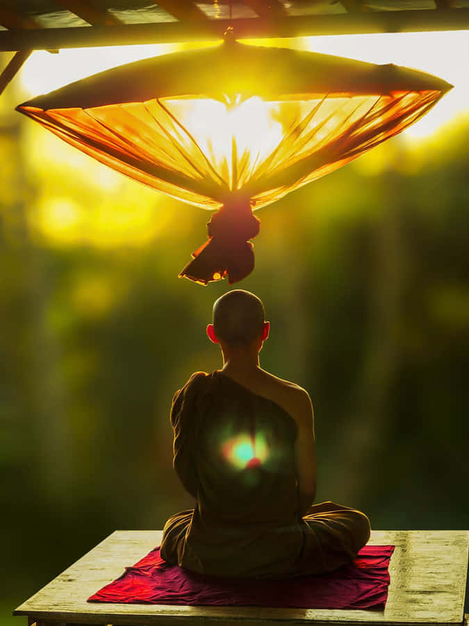 Spiritual Meditation In A Serene Nature Setting Wallpaper