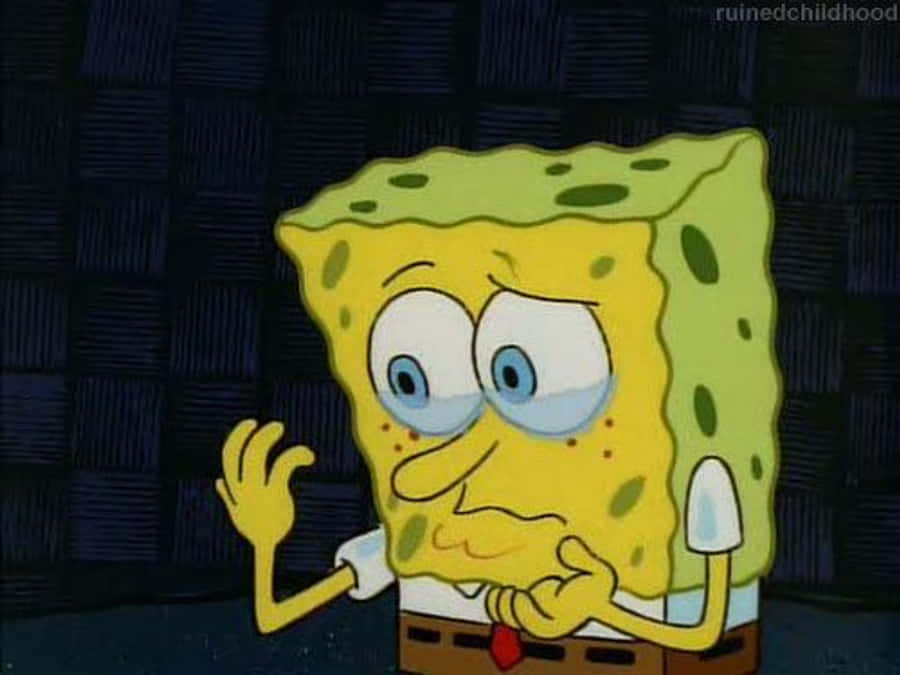 Spongebob Crying Looking At His Hand Wallpaper